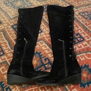 Black wedges over the knee boot